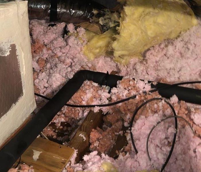 wet insulation in an attic due to roof leak